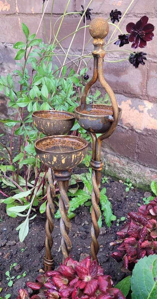 Rusty Double Set of Twisted Rain Catchers